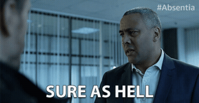 A Man In A Suit Says Sure As Hell In Front Of Another Man GIF