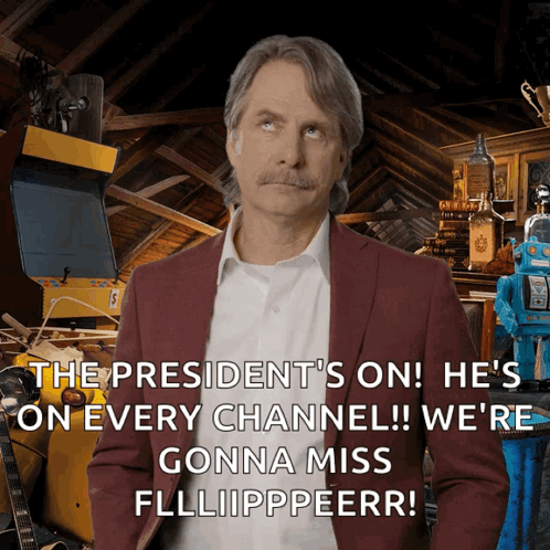 A Man In A Suit Says The President 'S On GIF