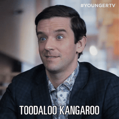 A Man In A Suit Says " Toodaloo Kangaroo " On A Screen GIF
