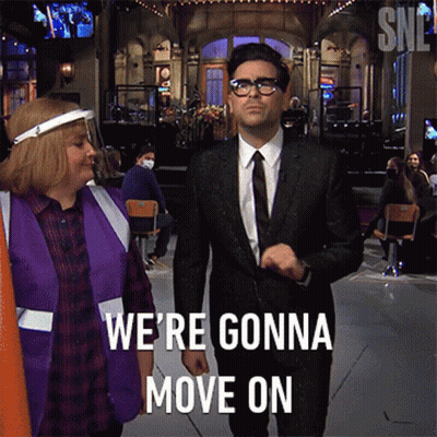 A Man In A Suit Says We 'Re Gonna Move On While Walking GIF