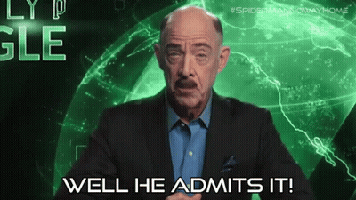 A Man In A Suit Says Well He Admits It In Front Of A Green Background GIF