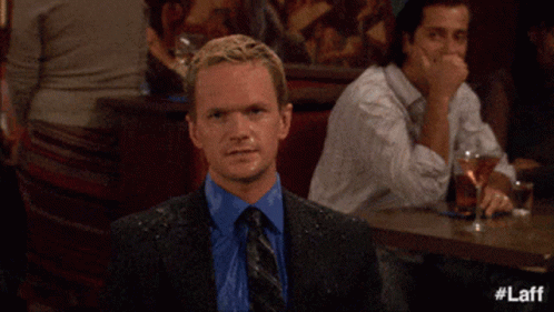 A Man In A Suit Says Well Played In A Bar GIF