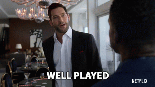 A Man In A Suit Says Well Played In Front Of Another Man GIF