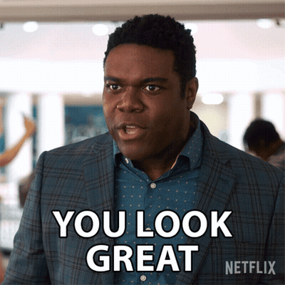 A Man In A Suit Says You Look Great In A Netflix Ad GIF