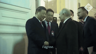 A Man In A Suit Shakes Hands With Another Man In A Suit And Tie With The Caption I Agree GIF