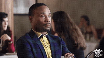 A Man In A Suit Sits At A Table With The Words Like A Boss Written On The Bottom GIF