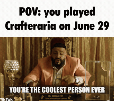 A Man In A Suit Sitting At A Desk With A Sign That Says Dj Khaled GIF
