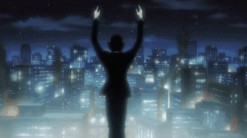 A Man In A Suit Stands In Front Of A City With His Arms In The Air GIF