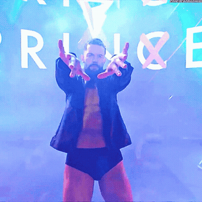 A Man In A Suit Stands In Front Of A Sign That Says " Rise " GIF