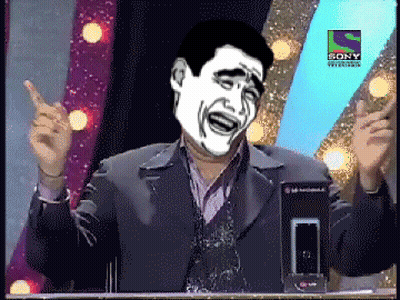 A Man In A Suit Stands In Front Of A Sony Television Sign GIF