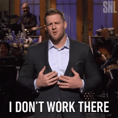 A Man In A Suit Stands In Front Of An Orchestra And Says " I Don 'T Work There " GIF