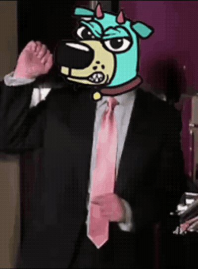 A Man In A Suit With A Dog Head On His Head GIF