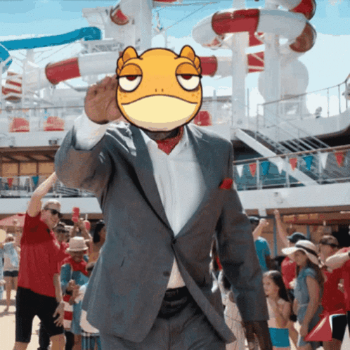 A Man In A Suit With A Frog On His Head GIF