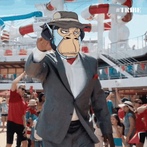 A Man In A Suit With A Monkey Face On His Face GIF