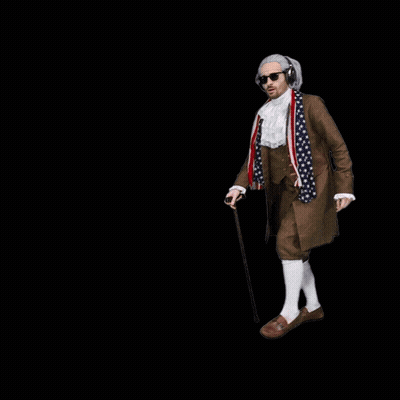 A Man In A Suit With An American Flag On It GIF