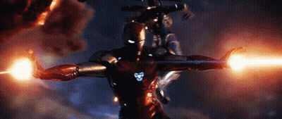A Man In A Superhero Costume Is Flying Through The Air GIF