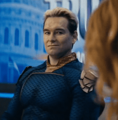 A Man In A Superhero Costume Is Looking At A Woman . GIF