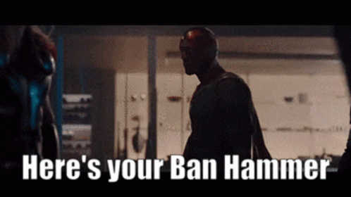 A Man In A Superhero Costume Is Saying Here 'S Your Ban Hammer . GIF