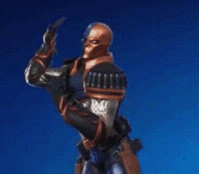 A Man In A Superhero Costume Is Standing In Front Of A Blue Sky With His Arms Outstretched . GIF