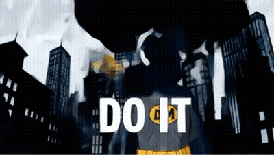 A Man In A Superhero Costume Is Standing In Front Of A City With The Words Do It Written On The Bottom . GIF
