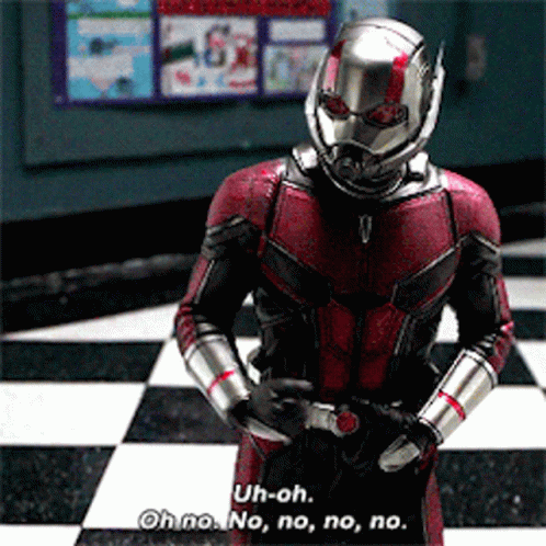 Superhero In Costume Saying Uh-Oh GIF
