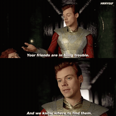 A Man In A Superhero Costume Says " Your Friends Are In Blig Trouble " GIF