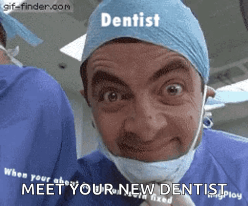A Man In A Surgical Cap And Mask Is A Dentist GIF