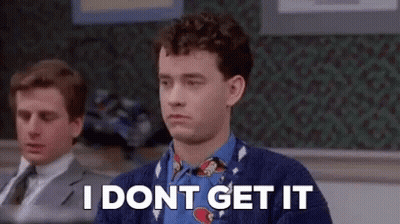 A Man In A Sweater And Tie Is Sitting In A Classroom And Saying `` I Do N't Get It '' . GIF
