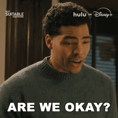 A Man In A Sweater Says " Are We Okay " In A Disney + Ad GIF