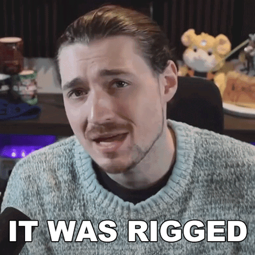 A Man In A Sweater Says It Was Rigged In Front Of A Stuffed Animal GIF