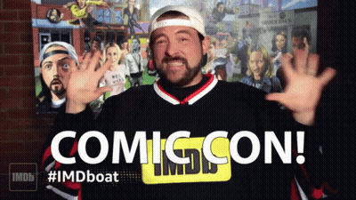 A Man In A Sweater That Says Comic Con GIF