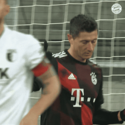 A Man In A T-Mobile Jersey Stands In Front Of A Soccer Net GIF