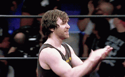 A Man In A Tank Top Is Clapping In A Ring GIF