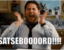 A Man In A Tie Is Screaming With The Words Satsebooord Written On His Face GIF