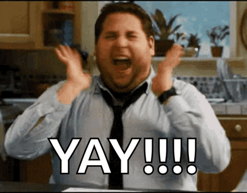 A Man In A Tie Is Screaming With The Words Yay !!! Written Below Him GIF