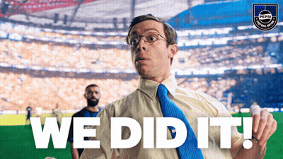 A Man In A Tie Says We Did It In Front Of A Stadium GIF