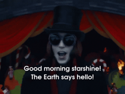 A Man In A Top Hat And Sunglasses Says Good Morning Starshine GIF