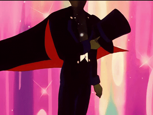 A Man In A Top Hat Is Standing In Front Of A Pink Backdrop GIF