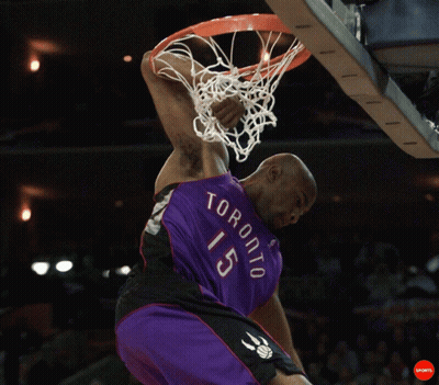 A Man In A Toronto 15 Jersey Dunks A Ball GIF