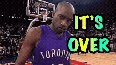 A Man In A Toronto Jersey Is Standing On A Basketball Court With The Words It 'S Over Above Him GIF