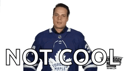 A Man In A Toronto Maple Leafs Jersey Giving A Thumbs Down Sign GIF
