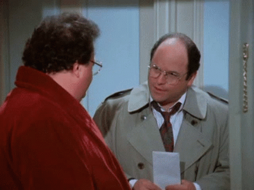 A Man In A Trench Coat And Tie Is Holding A Piece Of Paper And Talking To Another Man In A Red Robe . GIF