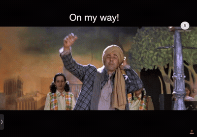 A Man In A Turban Is Waving His Hand With The Words On My Way Above Him GIF