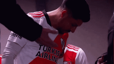 A Man In A Turkish Airlines Jersey Is Being Comforted GIF