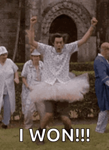 A Man In A Tutu Is Jumping In The Air And The Caption Says I Won !!! GIF
