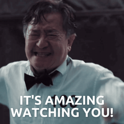 A Man In A Tuxedo And Bow Tie Crying With The Words It 'S Amazing Watching You Behind Him GIF