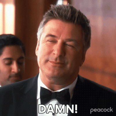 A Man In A Tuxedo And Bow Tie Is Making A Funny Face And Saying Damn . GIF