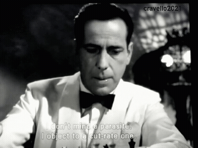 A Man In A Tuxedo And Bow Tie Says " I Do N't Mind A Parasite " GIF