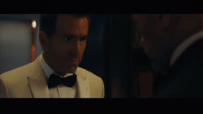 A Man In A Tuxedo And Bow Tie Says " You Love Me " GIF