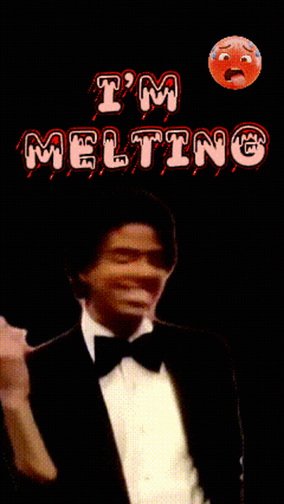 A Man In A Tuxedo And Bow Tie Stands In Front Of A Sign That Says Meg GIF